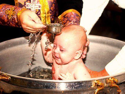 Що мають знати і робити хрещені батьки