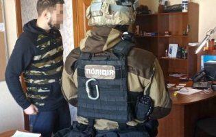 Поліція ліквідувала в Києві банду екстрасенсів (фото, відео)
