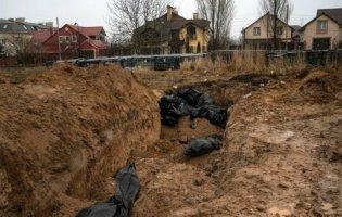 У Бучі виявляють місця масових поховань